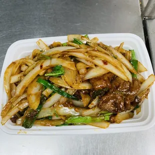 a plate of stir fried vegetables