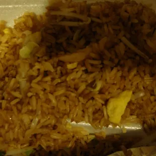Fried Rice underneath the T-Bone Steak upclose from New China Chef Take Out May 11th 2012