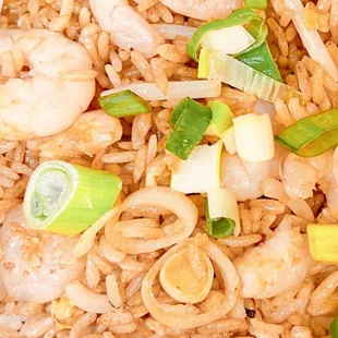 a plate of shrimp and rice