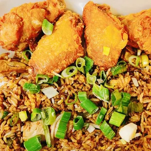 fried chicken and rice with green onions