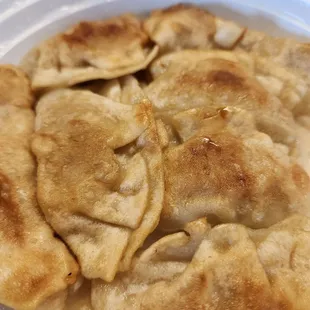 a plate of dumplings on a table