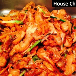 a dish of chicken and vegetables