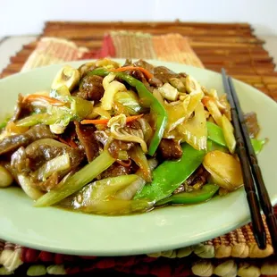 a plate of stir fried vegetables