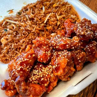 C07 Sesame Chicken ($10.35). Don't be fooled by the presentation. The chicken is overfried and the rice is bland.