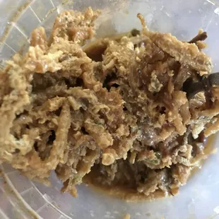 a plastic container with food in it