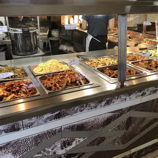 a buffet with a variety of food items