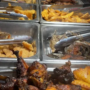 Some kind of baked Chicken really dry!  Shrimp, &amp; Fries. Nothing Special!