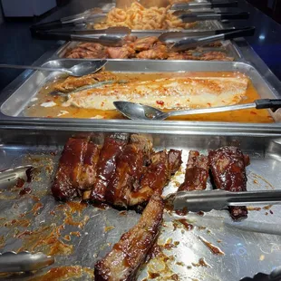 Ribs, Fish, Chicken, &amp; Shrimp.  Food was warm but had no flavor!