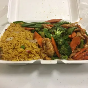 Chicken with mixed vegetables and prolly fried rice lunch special with tax only $6.38 came with a can of sofa.