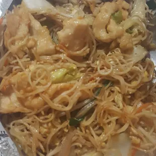 Taiwanese rice chicken noodles not spicy but very delicious too we also ordered one Thai tea I did not take a picture of it.