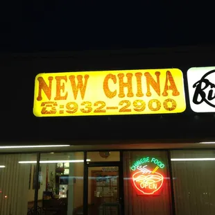a neon sign for a chinese restaurant