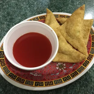 Crab wontons and sweet and sour sauce