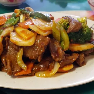 Szechuan beef was a little sweet and did not have the traditional whole peppers only pepper sauce.