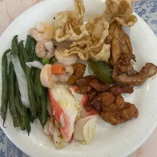 The peppered chicken and crab and cheese were okay, as well as a few of the green beans that weren't burnt up.