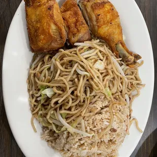 a plate of noodles and meat