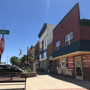 a bench on the sidewalk