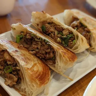 a plate of chinese food