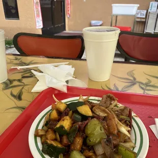 a plate of stir fried vegetables