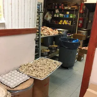 What's crawling on that pile of raw chicken?