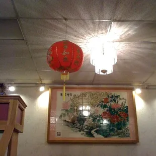 two red lanterns hanging from the ceiling