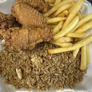 fried chicken and rice with french fries