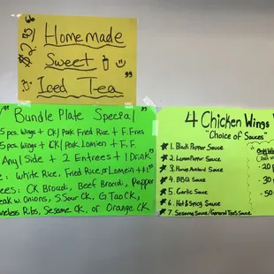 a bunch of notes attached to a refrigerator