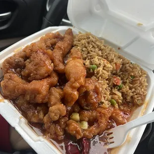 General Tao's chicken with vegetable fried rice. Dinner combo also comes with a crab Rangoon and a spring roll.