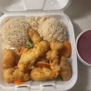 Sweet &amp; sour chicken with carrots, green pepper, onions and pineapple with fried rice.