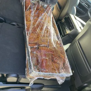 Whole roasted pig.  Sliced.  Piping hot.