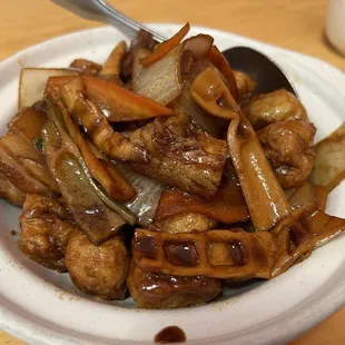 Braised pork belly with deep fried tofu.