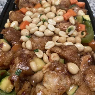 King Po Chicken, extra spicy, extra peanuts. Plenty of medium sized chicken nuggets in there.