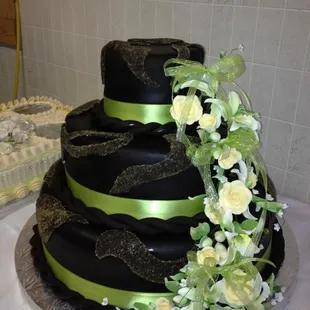 a black and green wedding cake