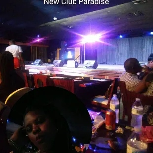 a group of people sitting at tables
