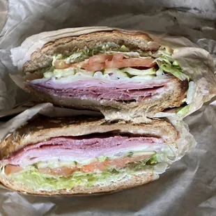 Ham &amp; Salami on a wheat roll with provolone cheese.