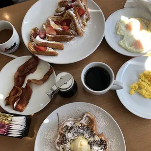 Coffee, French toasts, Banana Nutella Waffle, eggs and bacon