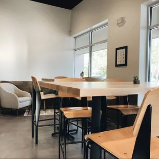 tables and chairs in a coffee shop