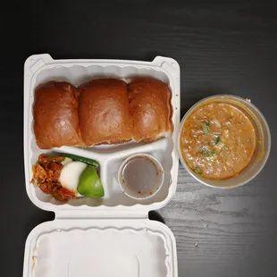 Pav Bhaji - Mashed and spiced mix veggies served with bread. Cooked with butter