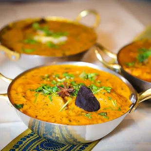 three bowls of indian food