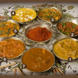 CURRIES 1) Chicken Korma 2) Keema Mattar 3) Lamb or Chicken Vindaloo 4) Murg Akbari 5) Chicken Tikka Masala 6) Chicken Madras