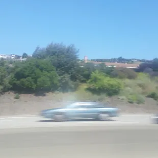 a car driving on the highway