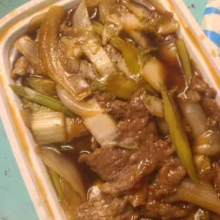 beef and onions in a bowl