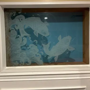 Etched glass window at bar area