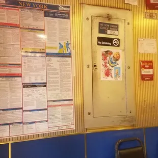 seating area with menus on wall