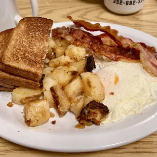 Sunrise Sampler with 2 eggs, bacon, home fries &amp; toast