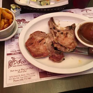 Grilled pork chips and mashed potatoes and gravy