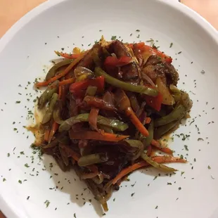 a plate of stir fried vegetables