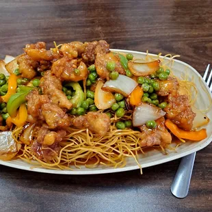 Pan fried noodles with chicken, peas, onions, bell peppers and sweet and sour sauce (special order, thank you!)