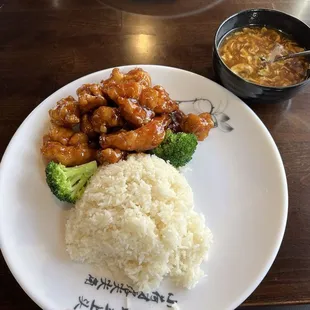 Orange chicken platter with white rice and hot and sour soup