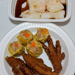 a plate of meat and dumplings