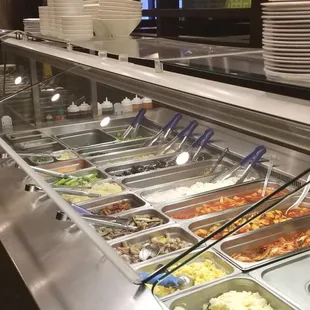 a buffet with a variety of food items